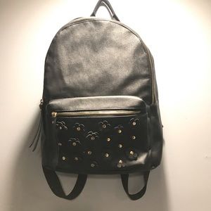 Black backpack with flowers
